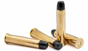 Four .45-70 Government 405gr RNFP Trapdoor cartridges displayed, ammunition designed for antique rifles and safe low-pressure shooting