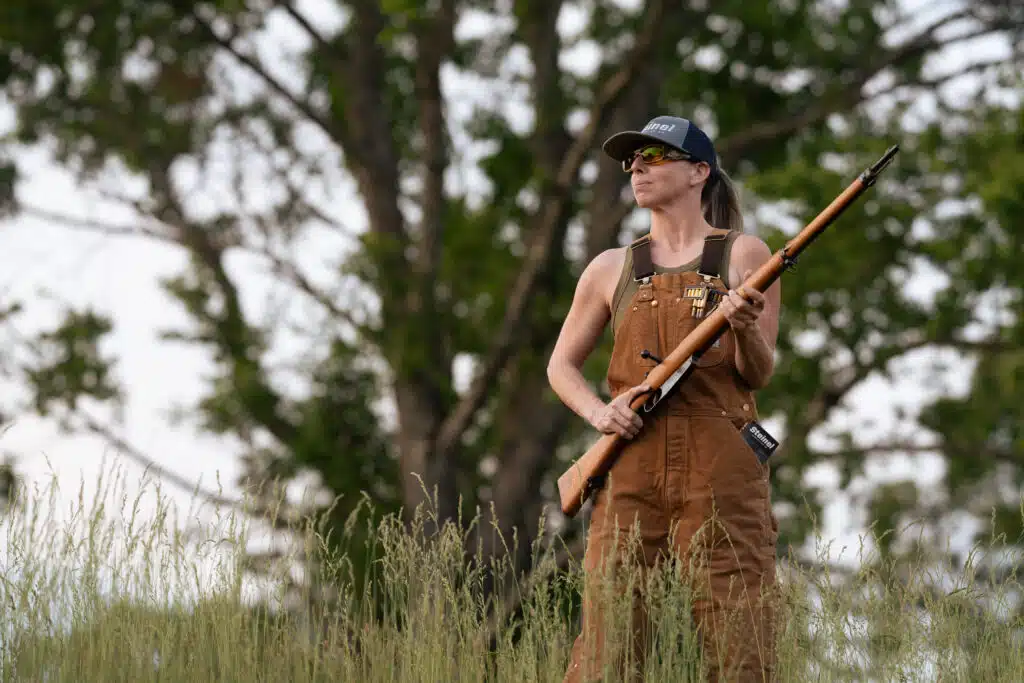 Women having rifle in her hands
