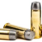 Four 45 Colt 315gr Hard Cast RNFP Ruger-only cartridges arranged side by side on white background