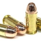 Four rounds of .455 Webley for shaved cylinders on display, loaded with .45 ACP cases and 230gr RN bullets