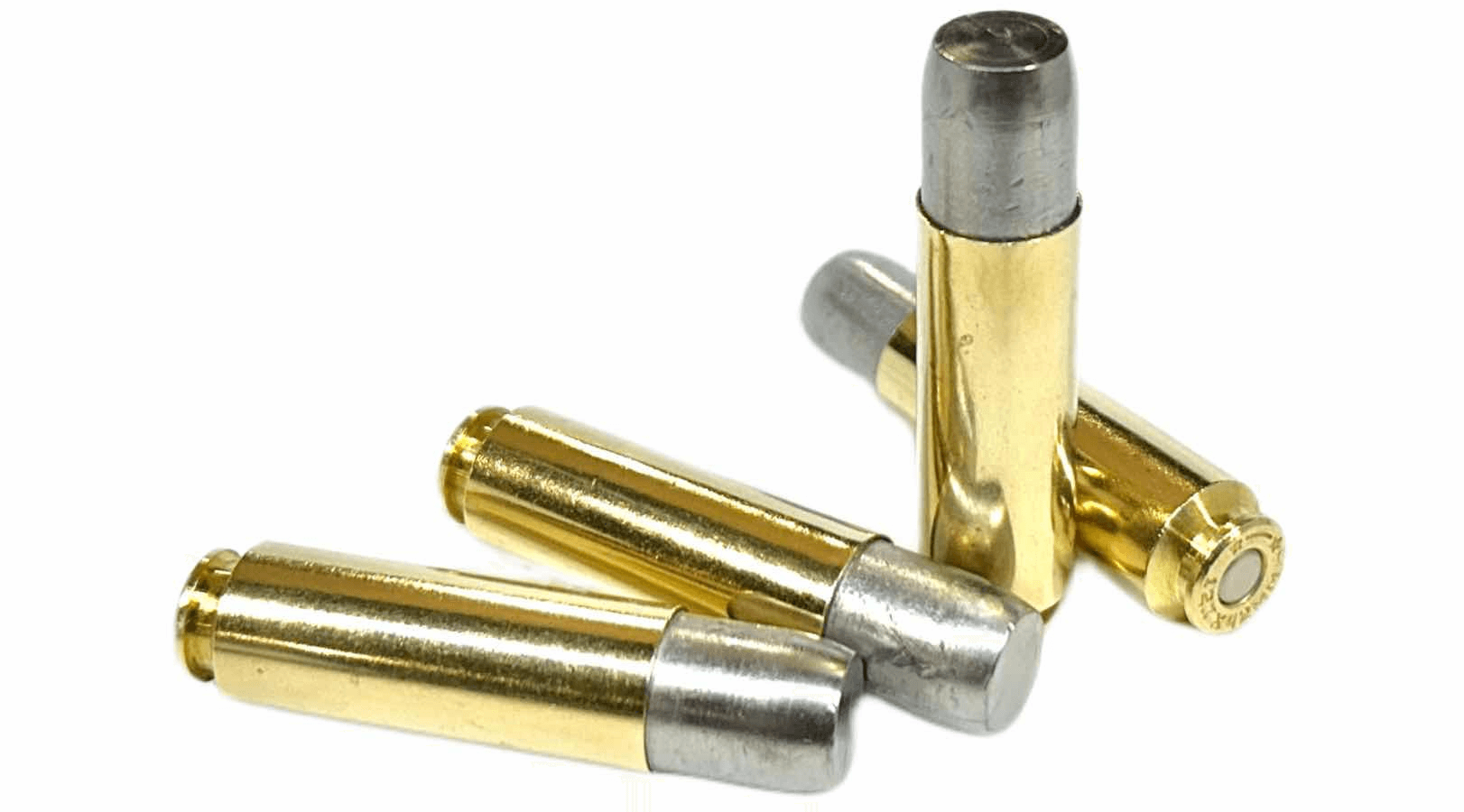 12.7x42-700gr-omega Four rounds of 12.7x42 ammo loaded with massive 700 grain hard cast bullets on a white background