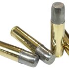Four .500 Auto Max 700gr hard cast “Omega” LFNGC cartridges on display — heavy flat nose gas check rounds built for maximum penetration and stopping power.