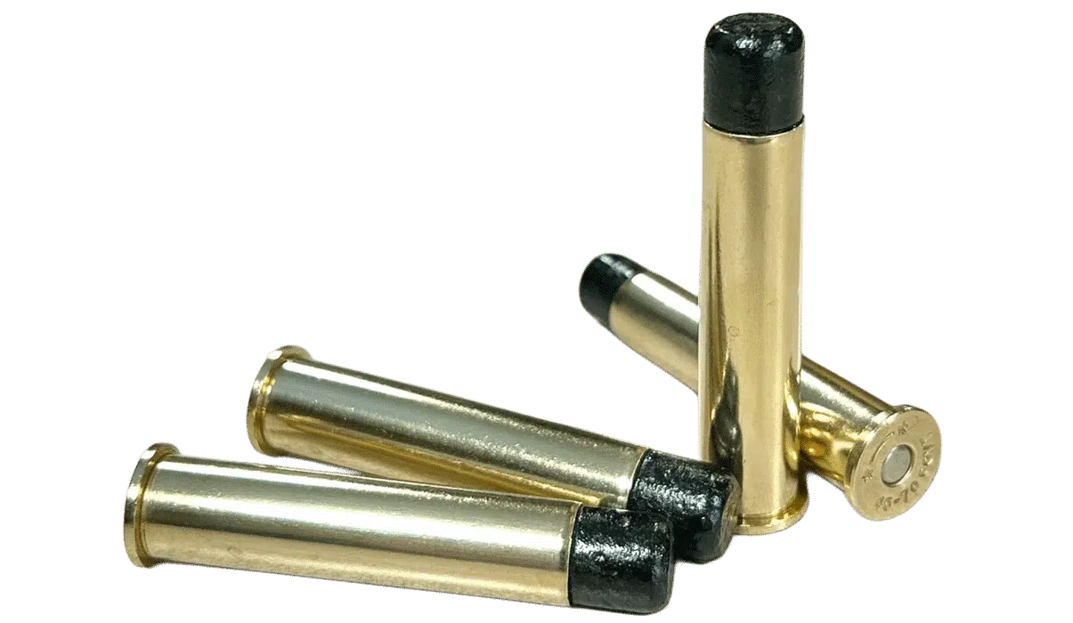45-70-777-gr-lucky-ram-subsonic-steinel One 45-70 Government 777gr Wide Flat Nose Lucky Ram cartridge standing and three lying flat—subsonic ammo with the heaviest bullet for big-bore lever guns and hunting.