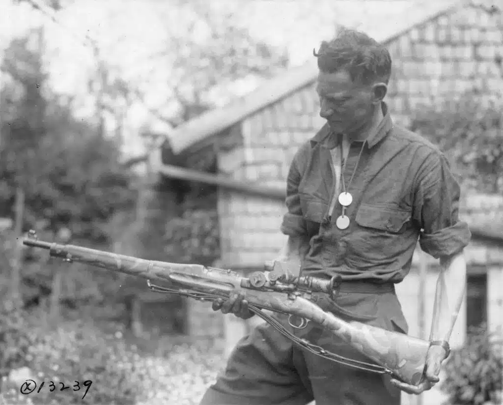 Camouflage painted M1903 Springfield sniper's rifle with Warner & Swasey telescopic sight in France, May 1918
